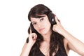 Beautiful young trendy girl using headphones Royalty Free Stock Photo