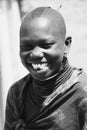 A beautiful young Turkana girl laughs with abandon in Karamoja, Uganda