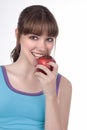 Beautiful young woman with apple