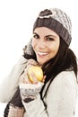 Beautiful young woman with apple. Winter style