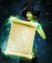 Beautiful young woman as halloween witch Royalty Free Stock Photo