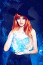 Beautiful young woman as halloween witch Royalty Free Stock Photo