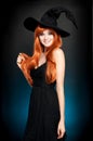 Beautiful young woman as halloween witch Royalty Free Stock Photo