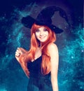 Beautiful young woman as halloween witch Royalty Free Stock Photo