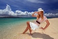 Beautiful young woman on the beach enjoy sunlight