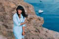 Beautiful young woman at beach looking at camera Royalty Free Stock Photo