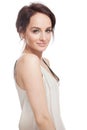 Beautiful young woman in beige nightgown on white Royalty Free Stock Photo