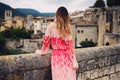 Beautiful young woman in Besalu, Spain