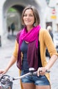 Beautiful young woman, bicycle, city