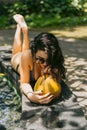 beautiful young woman in bikini and sunglasses drinking tropical cocktail Royalty Free Stock Photo