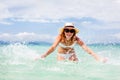 Beautiful young woman in bikini on the sunny tropical beach Royalty Free Stock Photo