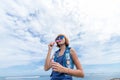 Beautiful young woman blowing bubble in outdoor, nature, near the ocean. Tropical magic island Bali, Indonesia. Royalty Free Stock Photo