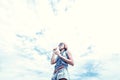 Beautiful young woman blowing bubble in outdoor, nature, near the ocean. Tropical magic island Bali, Indonesia. Royalty Free Stock Photo