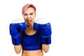 Beautiful young woman in blue boxing gloves is boxing, isolated Royalty Free Stock Photo