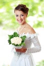 Beautiful young woman with bouquet outdoor Royalty Free Stock Photo