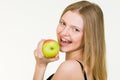 Beautiful Young woman with brackets eating apple Royalty Free Stock Photo