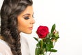 Beautiful young woman braided hair red rose Royalty Free Stock Photo