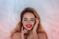 Beautiful young woman with bright makeup with closed eyes  dreams of something pleasant Royalty Free Stock Photo