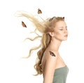 Beautiful young woman and butterflies on background Royalty Free Stock Photo