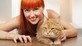 Beautiful young woman with cat