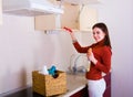 Woman cleaning her kitchen Royalty Free Stock Photo