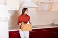 Woman cleaning her kitchen Royalty Free Stock Photo