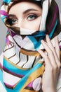 Beautiful young woman in color veil. beauty girl in colorful hijab Royalty Free Stock Photo