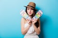 Beautiful young woman with colorful sandals standing in front of Royalty Free Stock Photo