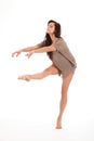 Beautiful young woman concentrates on dance moves Royalty Free Stock Photo