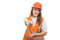 Beautiful young woman constructor holding thumb up