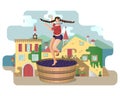 Beautiful young woman is crushing grapes with her feet while dancing in large wooden vat on the background of Italy village