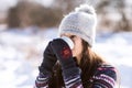 Beautiful young woman with cup of coffee in winter nature Royalty Free Stock Photo