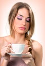 Beautiful young woman with a cup of tea/coffee Royalty Free Stock Photo