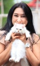 Beautiful young woman with cute white Persian cat Royalty Free Stock Photo