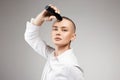 beautiful young woman cutting her hair. bald Girl with hairclipper Royalty Free Stock Photo