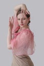 Beautiful young woman dancing flamenco in a pink beige dress Royalty Free Stock Photo