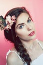 Beautiful young woman with delicate flowers in their hair Royalty Free Stock Photo