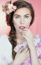 Beautiful young woman with delicate flowers in their hair Royalty Free Stock Photo