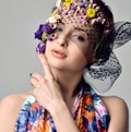 Beautiful young woman with delicate flowers in their hair Royalty Free Stock Photo