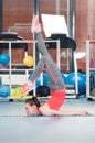 Beautiful young woman doing gimnastics on the floor Royalty Free Stock Photo