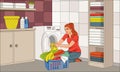 Beautiful young woman doing laundry at home. Royalty Free Stock Photo