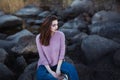 Beautiful young woman. Dramatic outdoor portrait of sensual brunette female with long hair. Sad and serious girl. Royalty Free Stock Photo