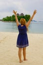 Beautiful young woman in a dress on the beach in sentosa island Royalty Free Stock Photo