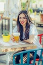 Beautiful young woman drinking beer and enjoying summer day Royalty Free Stock Photo