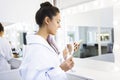 Beautiful young woman drinking champagne at spa Royalty Free Stock Photo