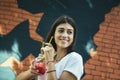 Young woman drinking cocktail in outdoor cafe Royalty Free Stock Photo