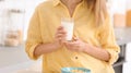 Beautiful young woman drinking milk Royalty Free Stock Photo