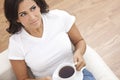 Beautiful Young Woman Drinking Tea or Coffee Royalty Free Stock Photo