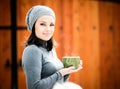 Beautiful young woman drinking tea