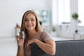 Beautiful young woman drinking water at home Royalty Free Stock Photo